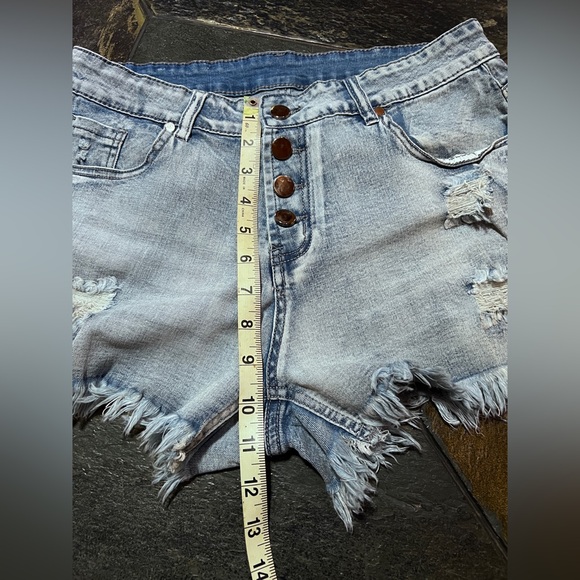 Short shorts.  Worn denim Size Large.  Stretchy.  3” inseam. Preowned. Buttonfly - Picture 3 of 7
